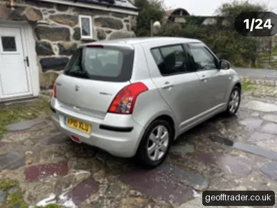2010 Suzuki Swift photo 1